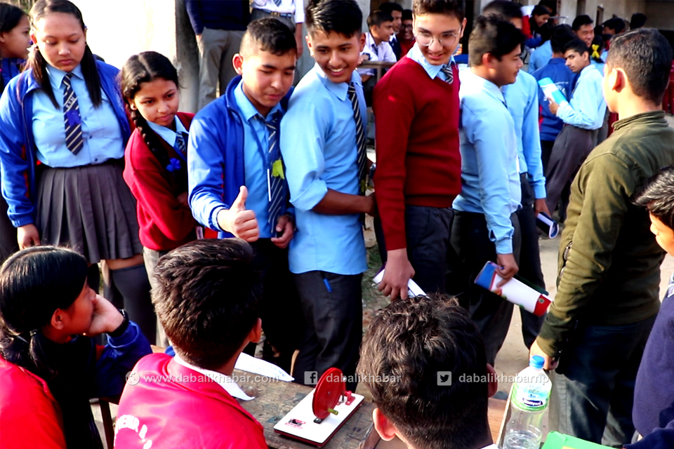 visitor students watching a science exhibition 